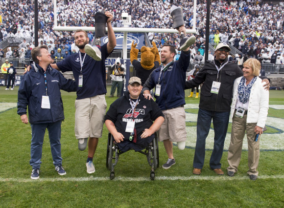 Penn State Athletic Director Sandy Barbour, left, joined Penn State Ability Athletes and Wounded Warriors Max Rohn, Dave Noblit, Ed Bonfiglio and Kortney Clemons, as well as Ability Athletics coach Teri Jordan, for recognition during Military Appreciation Day, Penn State vs. Army, Oct. 3, 2015.